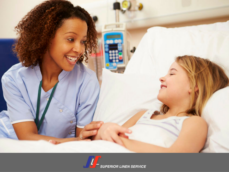 nurse and girl in hospital
